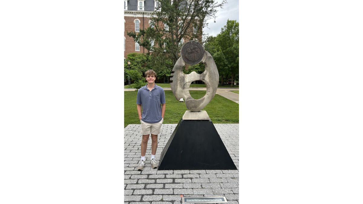 Carter at the Silas Hunt memorial at University of Arkansas