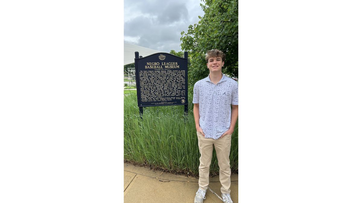 Carter at the Negro Leagues Baseball Museum sign