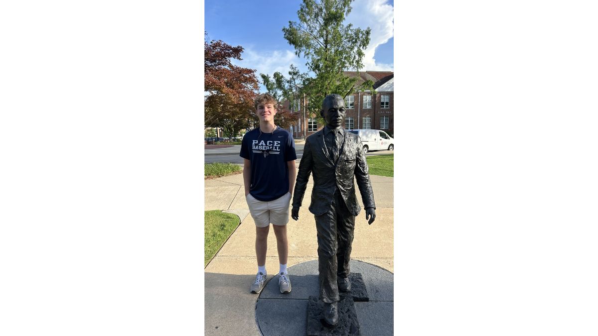 Carter with the James Meredith statue at Ole Miss